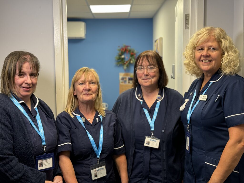 group of nurses smiling