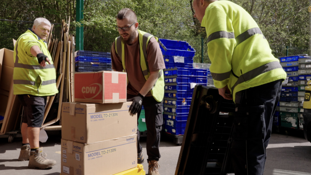 Picture shows Newlife warehouse workers loading stock in the loading bay at Newlife Cannock.